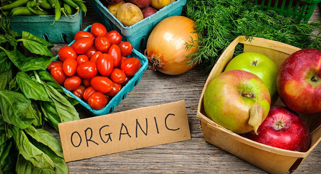 {"en-us":""} {"en-us":"Organic fruits and vegetables on wooden table"}